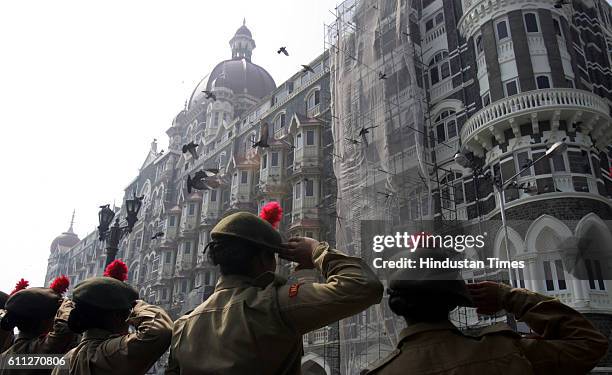 1st Anniversary - NCC Cadets from Kirti College salutes the victims killed inside the Taj Mahal hotel, one of the sites of Mumbai terror attacks, on...