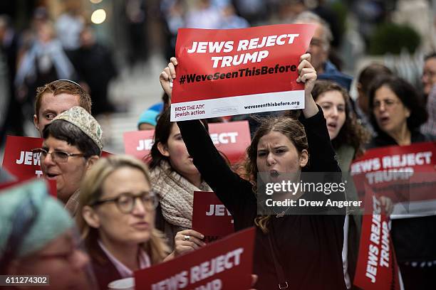 Protestors and members of a Jewish social action group rally against what they call hateful and violent rhetoric from Republican presidential...