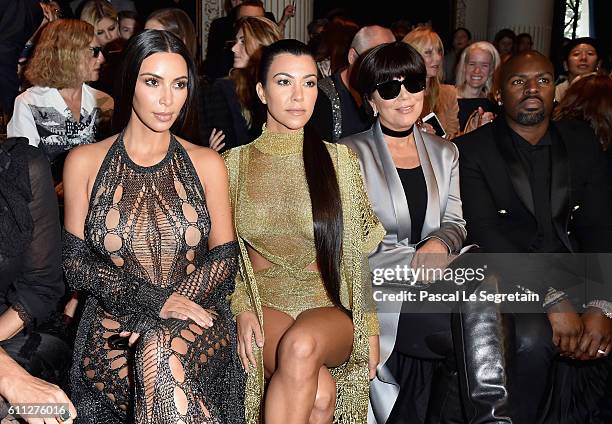 Kim Kardashian, Kourtney Kardashian, Kris Jenner and Corey Gamble attend the Balmain show as part of the Paris Fashion Week Womenswear Spring/Summer...