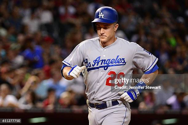 Chase Utley of the Los Angeles Dodgers runs home after hitting two run home run in the seventh inning against the Arizona Diamondbacks at Chase Field...