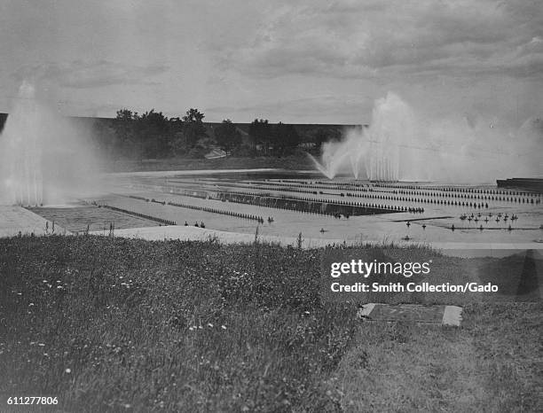 Water is sprayed into the air as the Ashokan reservoir aeration system is in partial operation during construction of the Catskill Aqueduct, New...