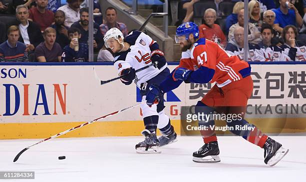 John Carlson of Team USA gets a shot off with pressure from Michal Jordan of Team Czech Republic during the World Cup of Hockey 2016 at Air Canada...