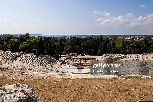 the greek theater at archeological park of siracusa, sicily, italy. - teatro greco taormina bildbanksfoton och bilder