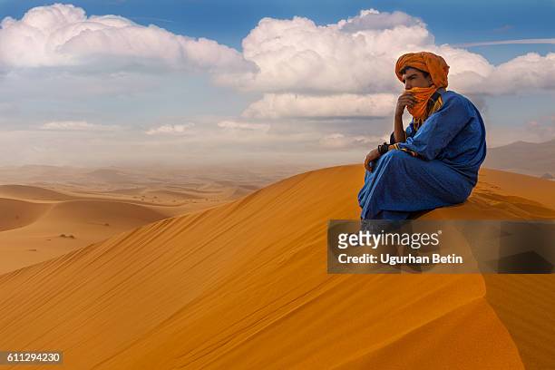 morocco man - merzouga stock pictures, royalty-free photos & images