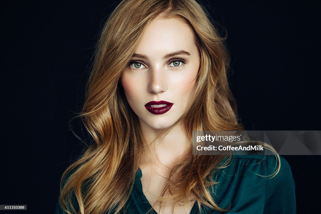 Studio shot of young beautiful woman