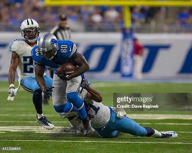 Anquan Boldin of the Detroit Lions runs against Kevin Byard of the Tennessee Titans during 3rd quarter action at Ford Field on September 18, 2016 in...