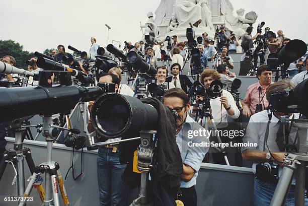 Press photographers outside Buckingham Palace in London for the wedding of Charles, Prince of Wales, and Lady Diana Spencer, 29th July 1981.