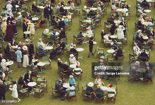 Garden party at Buckingham Palace, London, circa 1980.