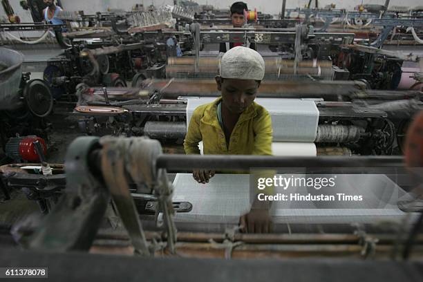 Views of Malegaon on 26/11 - Mumbai under Terror Attack - Child Labour - Textile Mills - Ten year old Sardar Khan is among the towns 12000 school...
