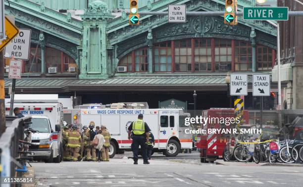 First responders are on the scene of the train crash at New Jersey Transit's rail station in Hoboken, New Jersey September 29, 2016. - One person was...