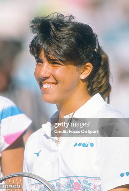 Jennifer Capriati of the United States looks on smiling during a match at the WTA Tour Virginia Slims of Florida circa 1990 at the Polo Club in Boca...