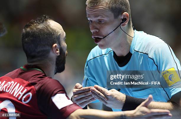 Ricardinho of Portugal is spoken to by a match official during the FIFA Futsal World Cup Semi Final match between Argentina and Portugal at the...