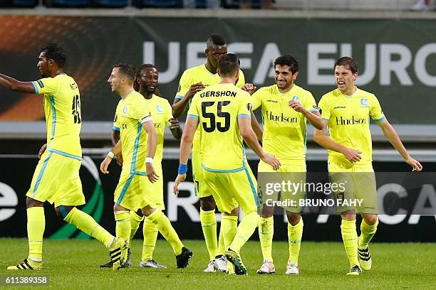 Gent's Kenneth Saief celebrates with his teammates after scoring during a game on the second day of the group stage of the Europa League competition...