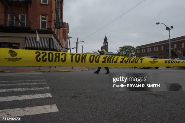 Police tape blocks off a street near the train crash at New Jersey Transit's rail station in Hoboken, New Jersey September 29, 2016. - One person was...