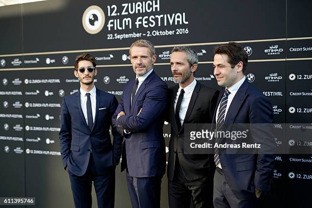 Pierre Niney, Lambert Wilson, Jerome Salle and Festival director Karl Spoerri attend the 'L'Odyssee' premiere during the 12th Zurich Film Festival on...