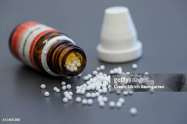 Homeopathy and naturopathy - if all else falls, the Naturopaths is the last hope for many people. The photo shows an overturned bottle and spilled...