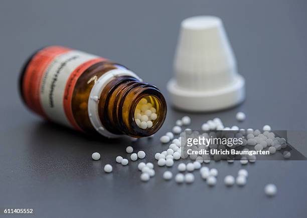 Homeopathy and naturopathy - if all else falls, the Naturopaths is the last hope for many people. The photo shows an overturned bottle and spilled...