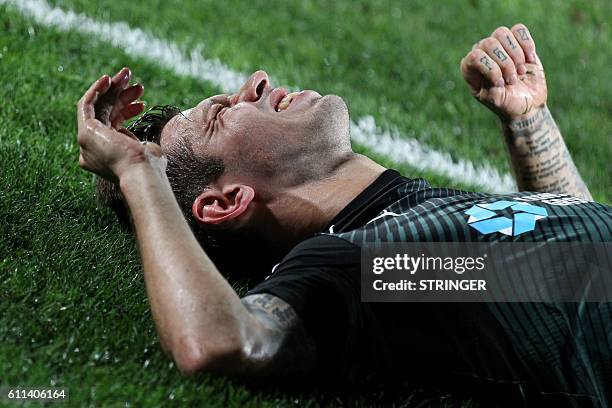 Krasnodar's Russian forward Fedor Smolov reacts during the UEFA Europa League group I football match between FC Krasnodar and OGC Nice in Krasnodar...