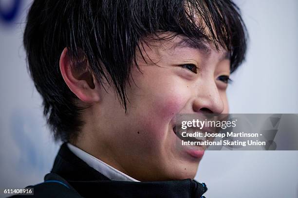 Koshiro Shimada of Japan reacts at kiss and cry after the Junior Men Short Program on day one of the ISU Junior Grand Prix of Figure Skating on...