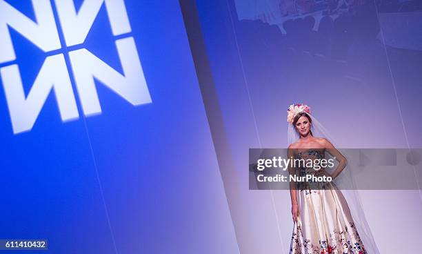 Modell walks the runway during Tamas Naray Fashion Show as part of BMW Wallis New Saloon Grand Opening Party on Sept 22, 2016 in Budapest, Hungary.