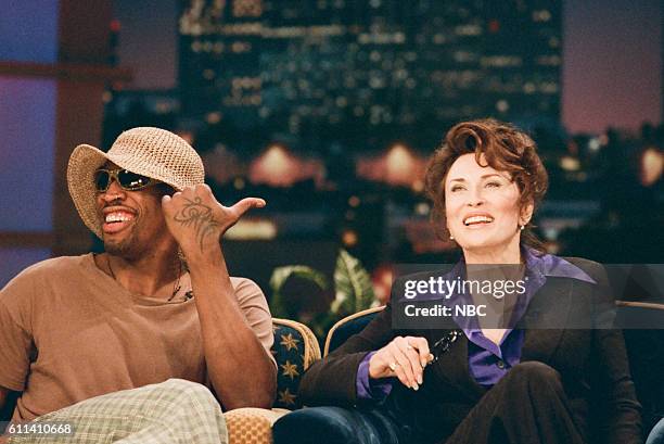 Episode 1172 -- Pictured: NBA basketball player Dennis Rodman and actress Faye Dunaway during an interview on June 18, 1997 --