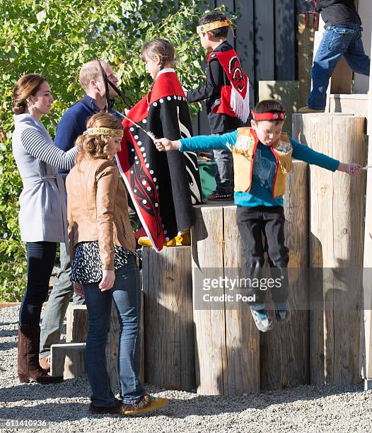 Prince William, Duke of Cambridge and Catherine, Duchess of Cambridge meet a peformer after watching a cultural welcome on September 28, 2016 in...