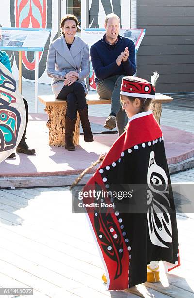 Prince William, Duke of Cambridge and Catherine, Duchess of Cambridge watch a cultural welcome on September 28, 2016 in Carcross, Canada.