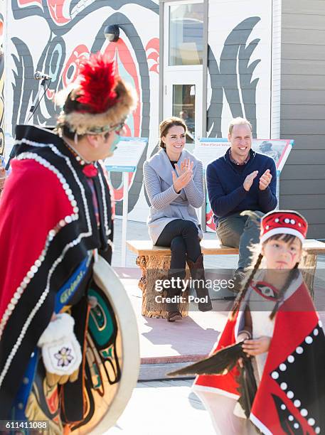 Prince William, Duke of Cambridge and Catherine, Duchess of Cambridge watch a cultural welcome on September 28, 2016 in Carcross, Canada.