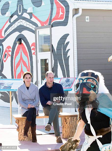 Prince William, Duke of Cambridge and Catherine, Duchess of Cambridge watch a cultural welcome on September 28, 2016 in Carcross, Canada.