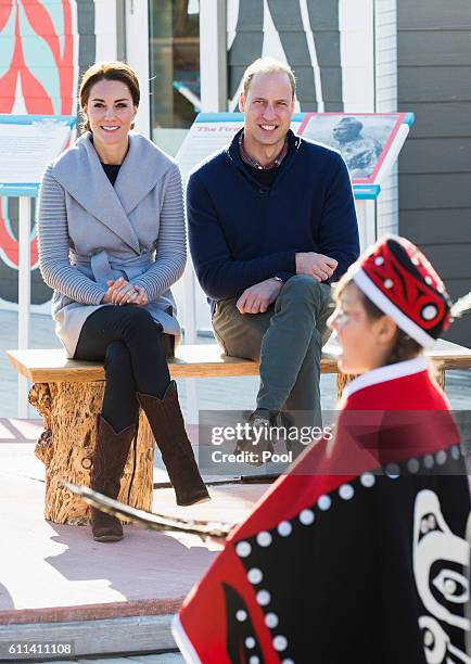 Prince William, Duke of Cambridge and Catherine, Duchess of Cambridge watch a cultural welcome on September 28, 2016 in Carcross, Canada.