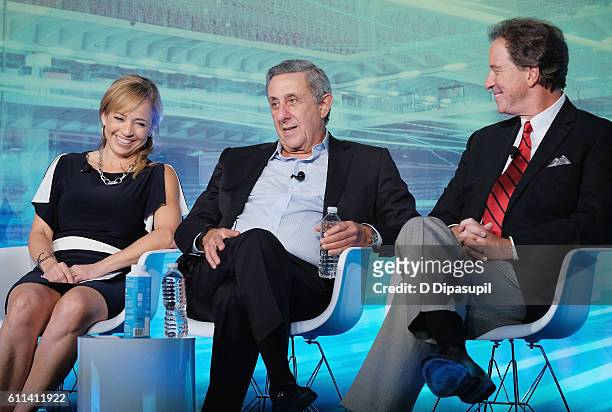 Sportscaster ESPN Stephania Bell, Sportscaster iHeartMedia, WOR-AM Len Berman and Sportscaster Westwood One Kevin Harlan speak at the Huddle Up -...