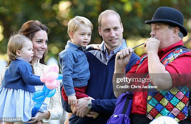 Catherine, Duchess of Cambridge, Princess Charlotte of Cambridge and Prince George of Cambridge, Prince William, Duke of Cambridge at a children's...