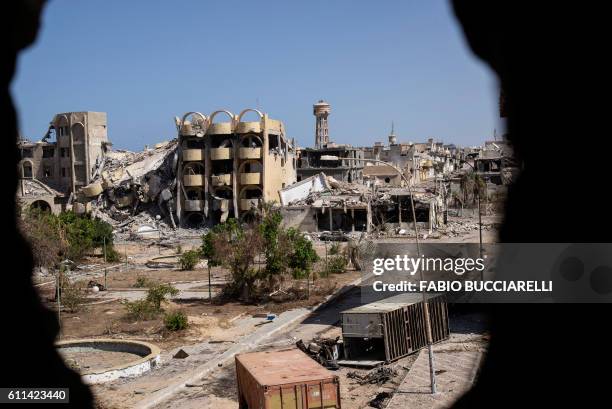 General view shows destroyed buildings in the District 3 neighbourhood of Sirte, the last stronghold of Islamic State group in the coastal Libyan...