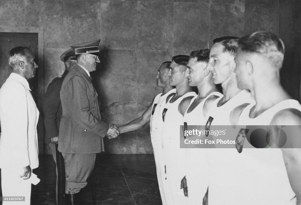 Hitler Rabble Rouser German dictator Adolf Hitler shakes hands with British rower Jack ...