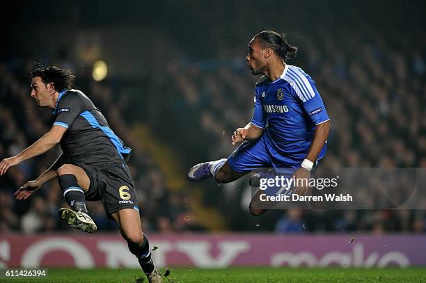 Didier Drogba of Chelsea scores the opening goal during the UEFA Champions League round of 16 second leg match between Chelsea FC and SSC Napoli...