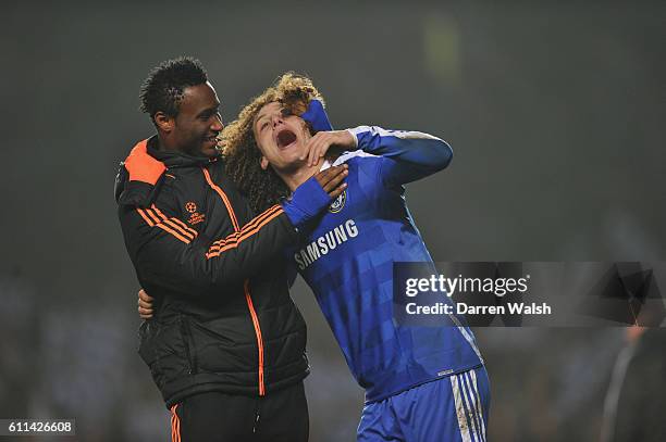 John Mikel Obi, David Luiz of Chelsea celebrates winning the UEFA Champions League round of 16 second leg match between Chelsea FC and SSC Napoli...