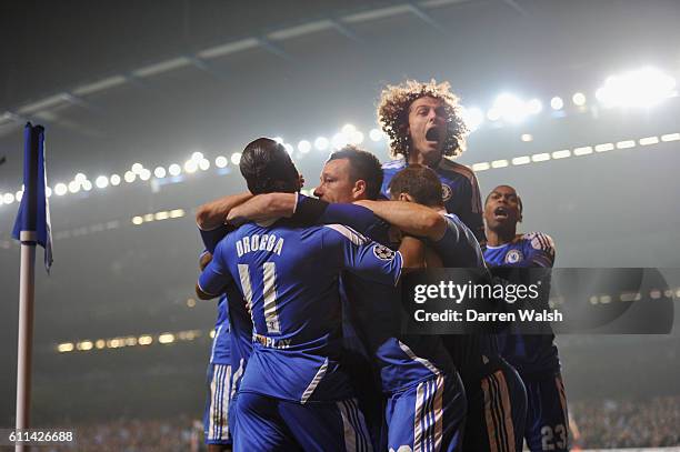 John Terry of Chelsea celebrates his goal during the UEFA Champions League round of 16 second leg match between Chelsea FC and SSC Napoli Stamford...