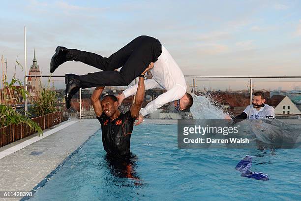 Didier Drogba throws Gary Cahill in to the pool during the Chelsea after party following their UEFA Champions League Final victory against Bayern...