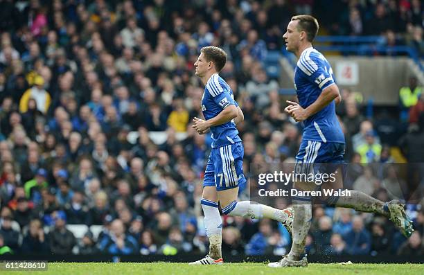 Sam Hutchinson and John Terry of Chelsea during the Barclays Premier League match between Chelsea and Queens Park Rangers at Stamford Bridge on April...