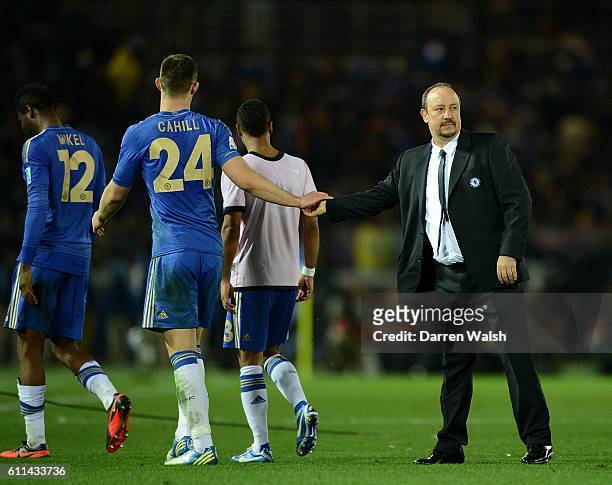 Chelsea manager Rafael Benitez celebrates victory with Gary Cahill after the final whistle