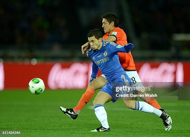 Chelsea's Eden Hazard and Monterrey's Neri Cardozo battle for the ball