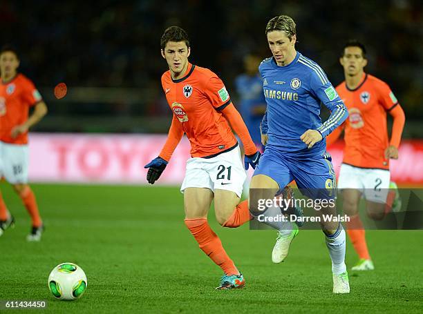 Chelsea's Fernando Torres and Monterrey's Hiram Ricardo Mier Alanis battle for the ball