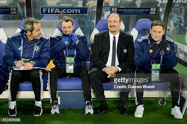 Chelsea manager Rafael Benitez with his staff on the bench
