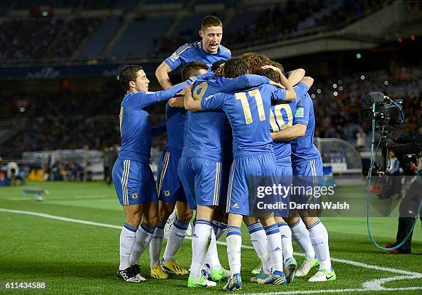 Chelsea players celebrate the teams first goal of the game