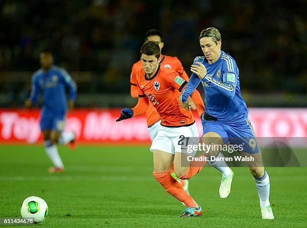 Chelsea's Fernando Torres and Monterrey's Hiram Ricardo Mier Alanis battle for the ball