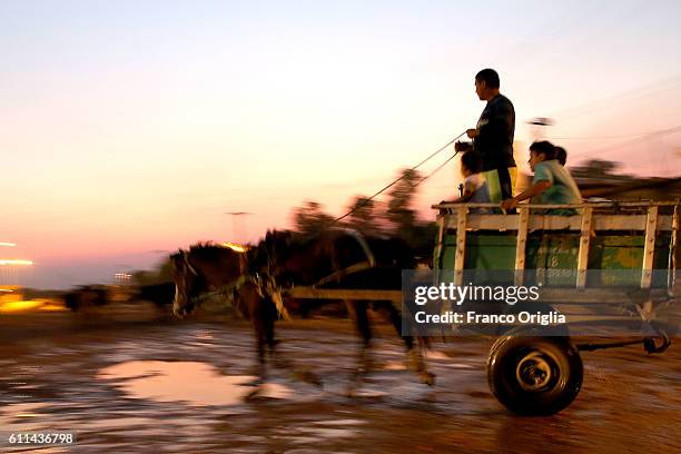 Carthorse drives a road in Cateura on September 29, 2016 in Asuncion, Paraguay. Cateura is a small town in Paraguay located about 6 miles south of...