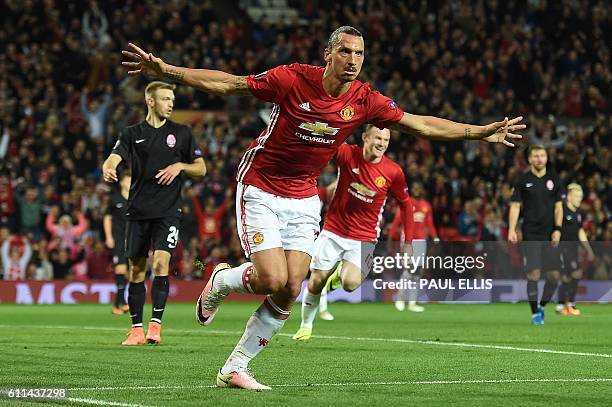 Manchester United's Swedish striker Zlatan Ibrahimovic celebrates scoring his team's first goal during the UEFA Europa League group A football match...