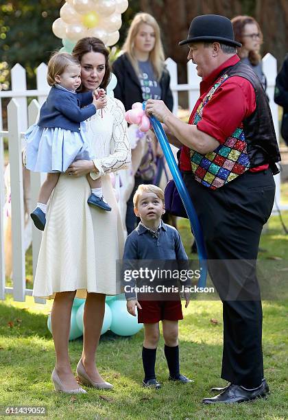 Catherine, Duchess of Cambridge, Princess Charlotte of Cambridge and Prince George of Cambridge at a children's party for Military families during...