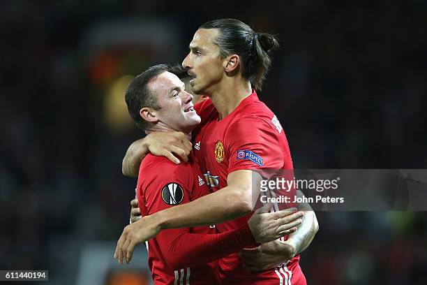 Zlatan Ibrahimovic of Manchester United celebrates scoring their first goal with Wayne Rooney during the UEFA Europa League match between Manchester...