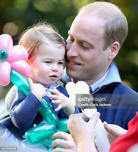 Princess Charlotte of Cambridge and Prince William, Duke of Cambridge at a children's party for Military families during the Royal Tour of Canada on...